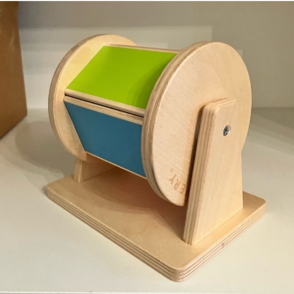 Green and Blue Learning Toy Rotating Drum